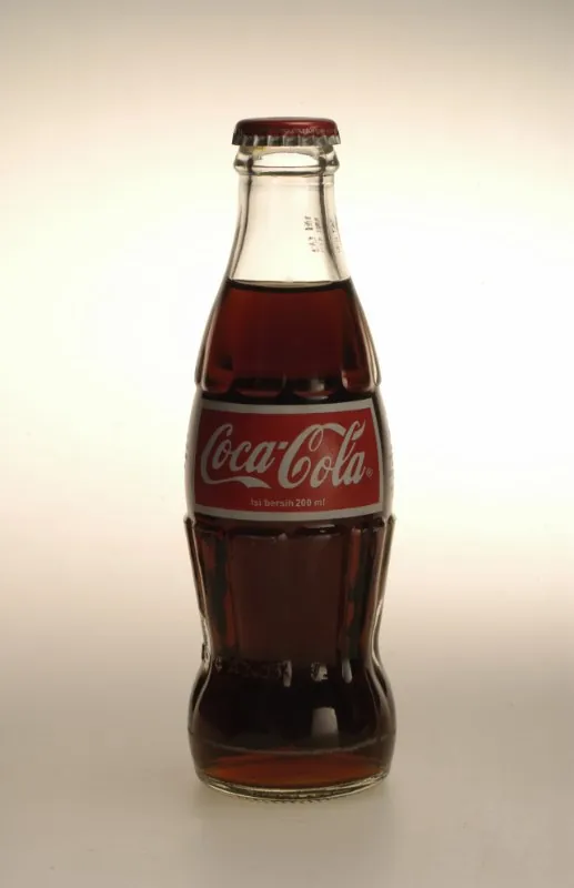 A glass cola bottle.